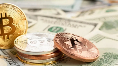 Индекс доллара упал к минимумам октября — криптоактивы растут